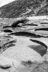 A rusty anchor is all that remained from a shipwreck on the australien coast.