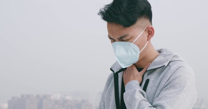 man sore throat with mask