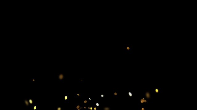 A large number of spangles flying on the surface of a round shape gold color on a black background