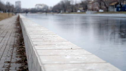Obraz premium The first ice on the river. Winter background for your design.
