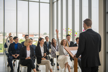 The leaders of the company and their partners are meeting inside the building.