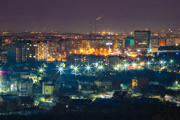Fototapeta premium Night panorama of the city in winter