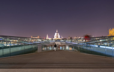 Fototapeta na wymiar View of Millennium bridge and St Paul's Cathedral at night