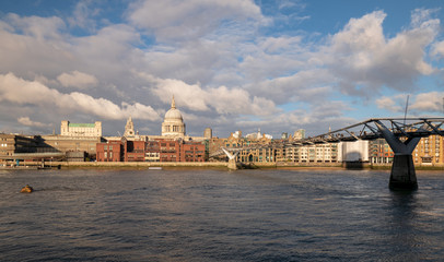 Fototapeta na wymiar View of St Paul's Cathedral and millennium bridge over river Thames