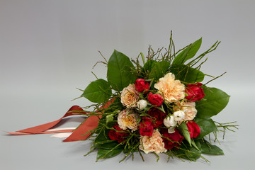 Beautiful bouquet in vintage style, light gray background, selective focus