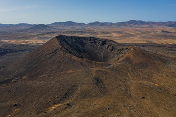 aerial drone view on volcano Caldera Los Arrabales, fuerteventura, canary islands, Spain. October 2019