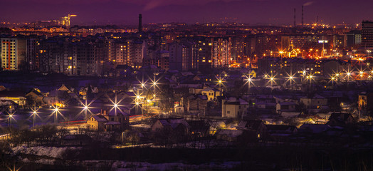 Fototapeta premium Night panorama of the city in winter