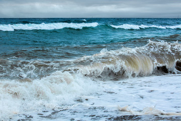 Raging sea in a cloudy day seascape theme