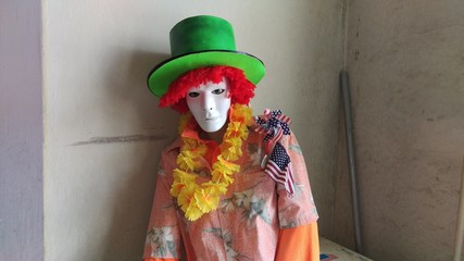 Red Haired Mime wearing a Green Hat