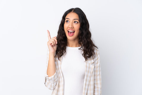 Mixed race woman over isolated white background intending to realizes the solution while lifting a finger up