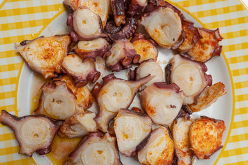 Octopus dish cooked in the style of Galicia and artisan bread. Pulpo a Feira.