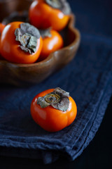 persimmons in a bowl