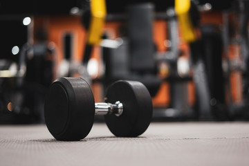 Naklejka na ściany i meble Gym and dumbbell weight training equipment on sport ,Healthy life and gym exercise equipments and sports concept ,copy space