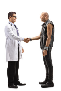 Young Male Doctor Shaking Hands With A Punk Man