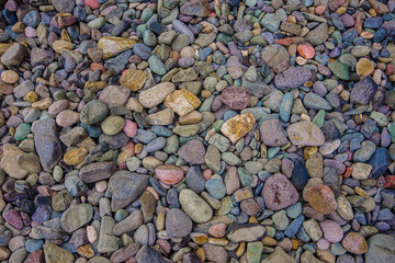 Colored stones on the beach. 