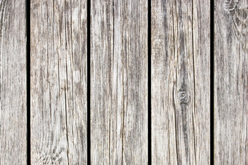 Gray wooden wall. Parallel desks background. Natural rustic hardwood board texture. Grunge old weathered wood surface.