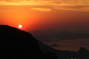 beautiful picture of a sun bathing inside red burn