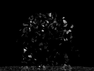 Glass panel exploding up into hundreds of pieces