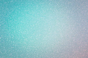 Sparkling turquoise background, abstract christmas glitter