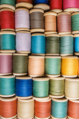 rolls of colorful threads, close-up and top view.