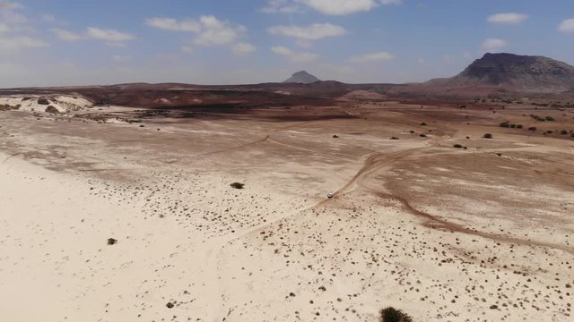 Aerial view footage of the desert and the sand dunes near the praia de varandinha in Boa Vista island, Cape Verde, Africa