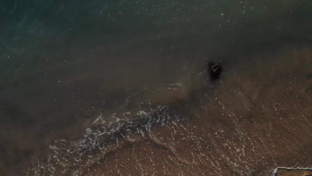 4k cinematic b-roll drone shot of flying above Pantai Puteri, famous beach at Melaka, Malaysia. 