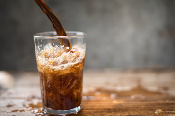 Ice cubes with soft drink.