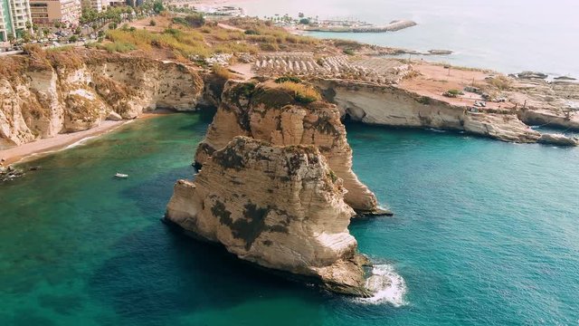 Roucheh rocks in Beirut, Lebanon in the sea in 4K quality, Pigeon Rocks in Mediterranean sea.
