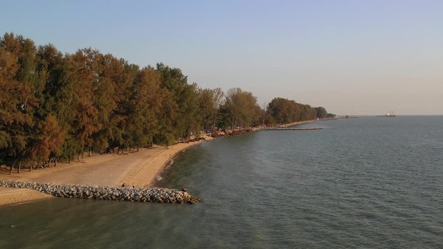 4k cinematic b-roll drone shot of flying above Pantai Puteri, famous beach at Melaka, Malaysia. 