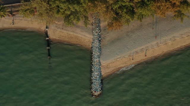 4k cinematic b-roll drone shot of flying above Pantai Puteri, famous beach at Melaka, Malaysia. 