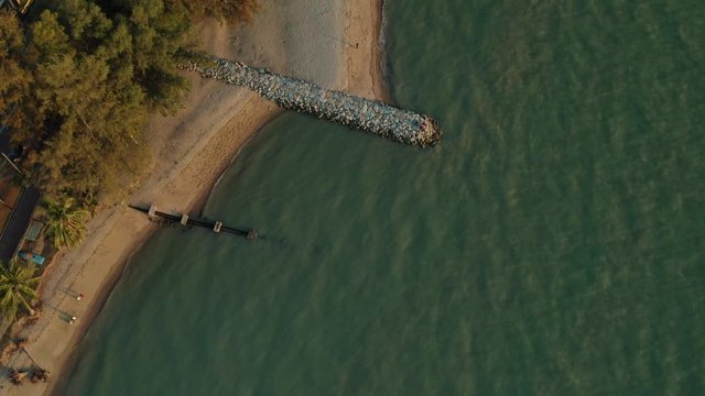 4k cinematic b-roll drone shot of flying above Pantai Puteri, famous beach at Melaka, Malaysia. 