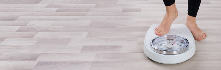 Person Standing On Weighing Scale