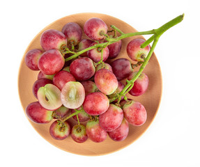 Fresh red grape isolated on white background.