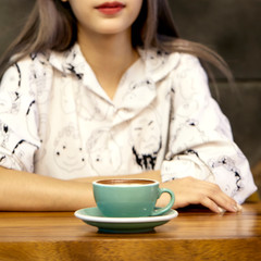 Woman with Coffee Mug Hot latte art