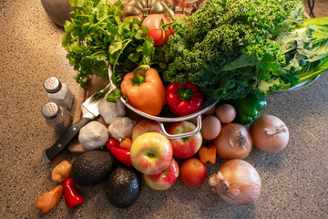 various vegetables on an apartment kitchen counter