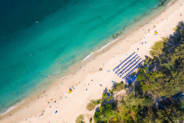 Aerial top down view of Nai Harn beach during sunny day at high season