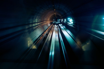 Train moves underground, motion blurred image of the subway