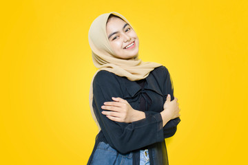 Portrait of Asian women with happy face on yellow background