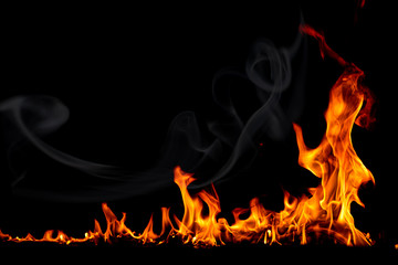 On fire flames at the black background