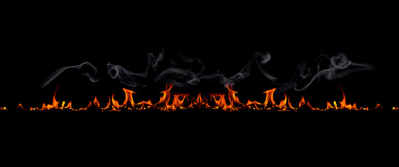 On fire flames at the black background