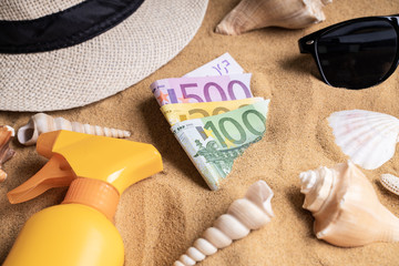Euros In Sand On Beach