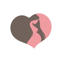 Silhouette of a young pregnant woman