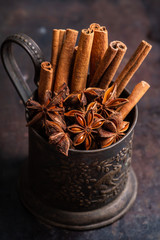 Dried anise stars on the rustic background. Selective focus. Shallow depth of field.