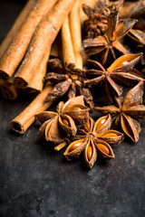 Dried anise stars on the rustic background. Selective focus. Shallow depth of field.