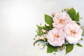 Fototapeta premium Delicate blossoming roses and blooming flowers festive background, pastel and soft bouquet floral card, selective focus, toned