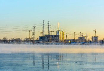Fototapeta na wymiar Frosty Sunny January day on the banks of the Neva river.