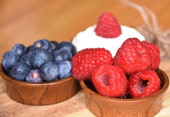 fresh ripe berries, raspberries, blueberries and yogurt