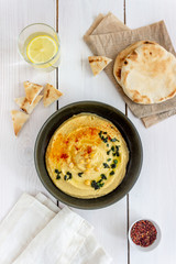 Hummus on a white background. Pete. Recipes. Vegetarian food. Healthy eating.