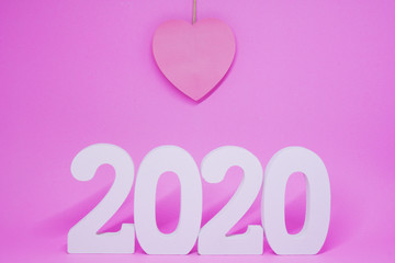 Single or Lonely Pink Heart -  Pink Heart Paper Object on Pink Background - Valentine Day 2020 - Lover Concept  with Copy space                                                          