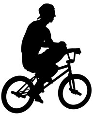 Young athlete on a bike for extreme stunts. Isolated silhouette on a white background